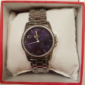 Coach Watch, small scratch as can see in photos